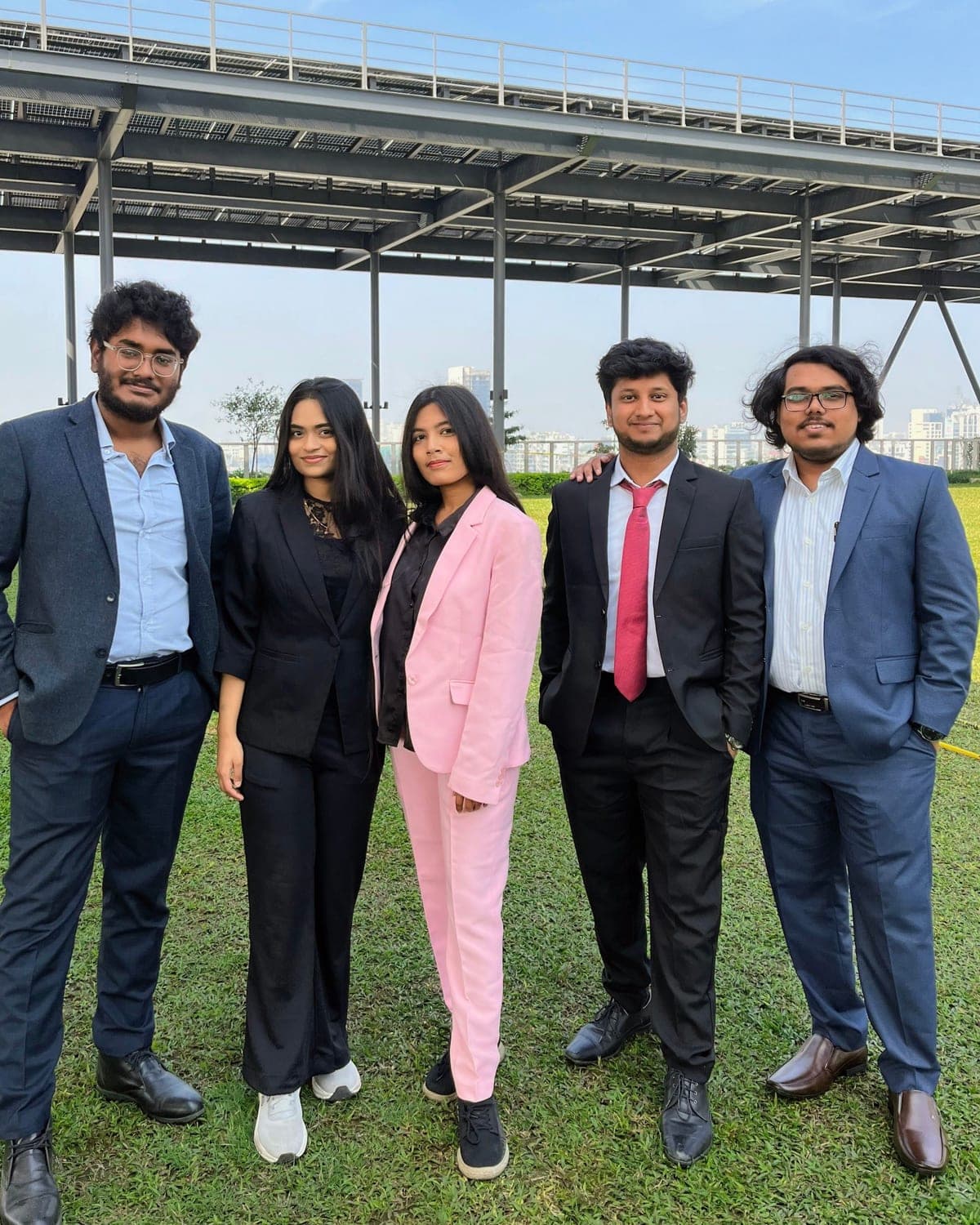 The five of us in formal wear on the rooftop lawn, defence day.